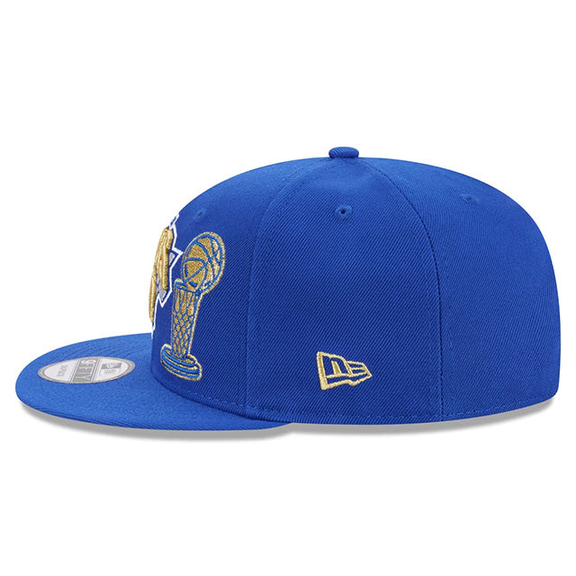 海外取寄 ニューエラ キャップ 9FIFTY ニューヨーク ニックス 2026 NBA FINALS CHAMPIONS RING CEREMONY SNAPBACK CAP BLUE