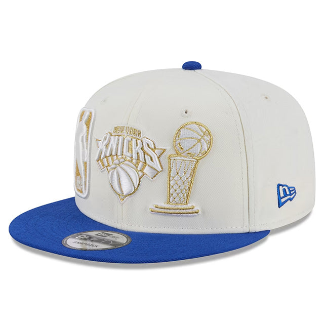 海外取寄 ニューエラ キャップ 9FIFTY ニューヨーク ニックス 2026 NBA FINALS CHAMPIONS LOCKER ROOM RING CEREMONY SNAPBACK CAP WHITE-BLUE