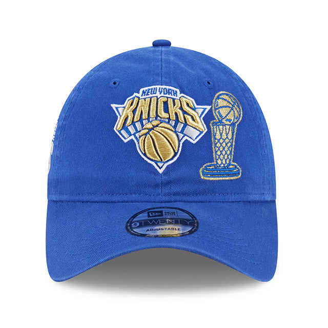 海外取寄 ニューエラ キャップ 9TWENTY ニューヨーク ニックス 2026 NBA FINALS CHAMPIONS RING CEREMONY STRAPBACK CAP BLUE