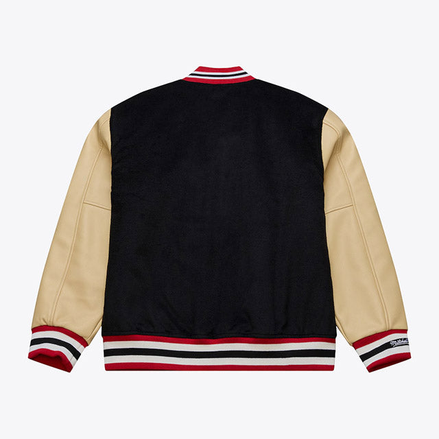 海外取寄 ミッチェル&ネス スタジアムジャケット サンフランシスコ 49ERS NFL TEAM TRADITIONS VARSITY FULL-SNAP JACKET BLACK-TAN