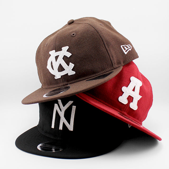 ニューエラ キャップ RC9FIFTY カンザスシティ モナークス WOOL FLAT VISOR FELT PATCH STRAPBACK CAP WALNUT
