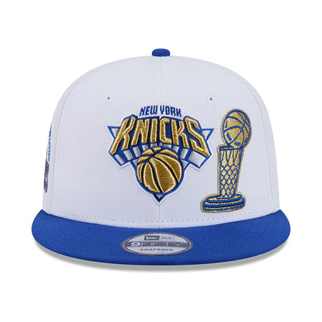 海外取寄 ニューエラ キャップ 9FIFTY ニューヨーク ニックス 2026 NBA FINALS CHAMPIONS RING CEREMONY SNAPBACK CAP WHITE-BLUE
