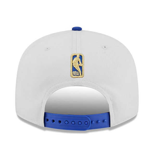 海外取寄 ニューエラ キャップ 9FIFTY ニューヨーク ニックス 2026 NBA FINALS CHAMPIONS RING CEREMONY SNAPBACK CAP WHITE-BLUE