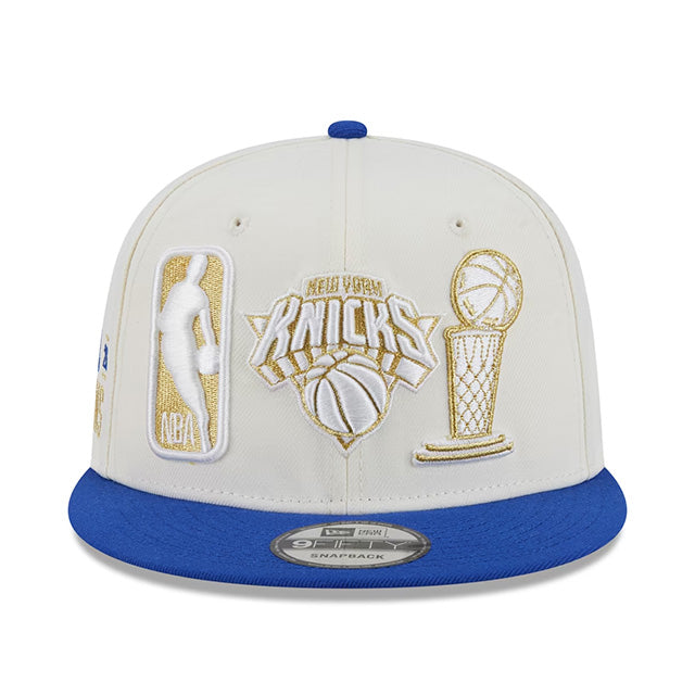 海外取寄 ニューエラ キャップ 9FIFTY ニューヨーク ニックス 2026 NBA FINALS CHAMPIONS LOCKER ROOM RING CEREMONY SNAPBACK CAP WHITE-BLUE