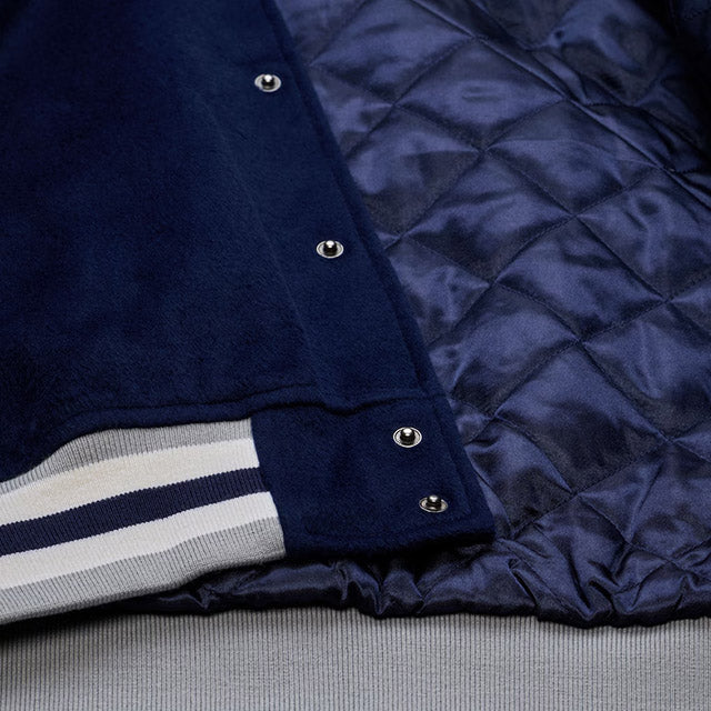 海外取寄 ミッチェル&ネス スタジアムジャケット ダラス カウボーイズ NFL TEAM TRADITIONS VARSITY FULL-SNAP JACKET NAVY-TAN