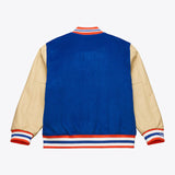 海外取寄 ミッチェル&ネス スタジアムジャケット ニューヨーク ニックス NBA TEAM TRADITIONS VARSITY FULL-SNAP JACKET BLUE-TAN