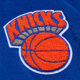 海外取寄 ミッチェル&ネス スタジアムジャケット ニューヨーク ニックス NBA TEAM TRADITIONS VARSITY FULL-SNAP JACKET BLUE-TAN