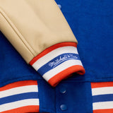 海外取寄 ミッチェル&ネス スタジアムジャケット ニューヨーク ニックス NBA TEAM TRADITIONS VARSITY FULL-SNAP JACKET BLUE-TAN