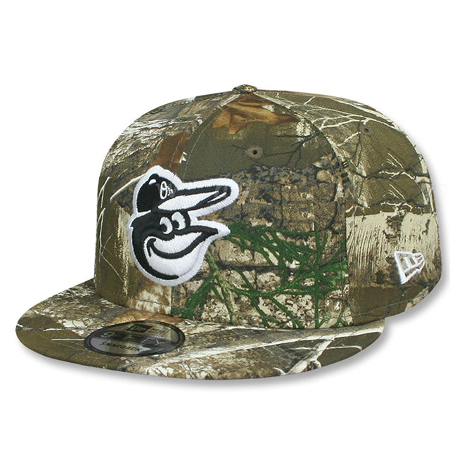 ニューエラ キャップ 9FIFTY スナップバック ボルチモア オリオールズ MLB TEAM BASIC SNAPBACK CAP REALTREE  CAMO / 国内外からニューエラをはじめナイキ、クーパーズタウンボールキャップ等を中心に取り扱うベースボールキャップの専門店 /  Amazingstore(アメイジング ...