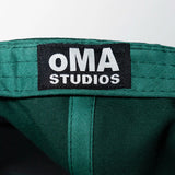 海外取寄 oMA STUDIOS スナップバックキャップ OAKLAND N SNAPBACK CAP GREEN